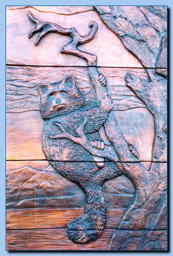1-47 raccoon in carved door